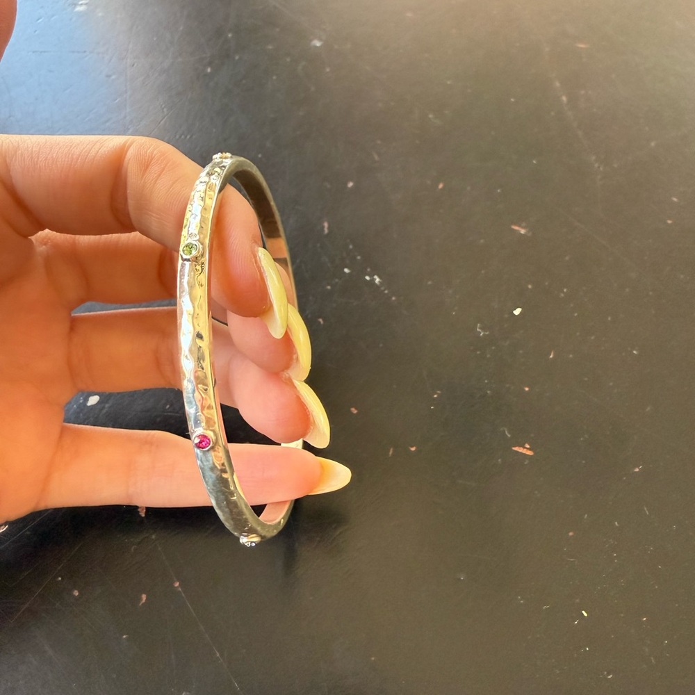 Elegant Silver Bangle with Gem Accents
